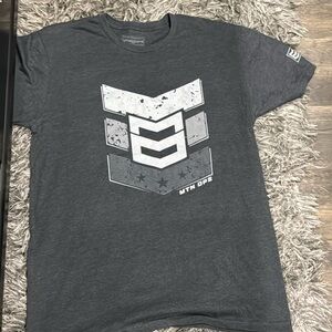 Brand new. Never worn MTN OPS T Shirt